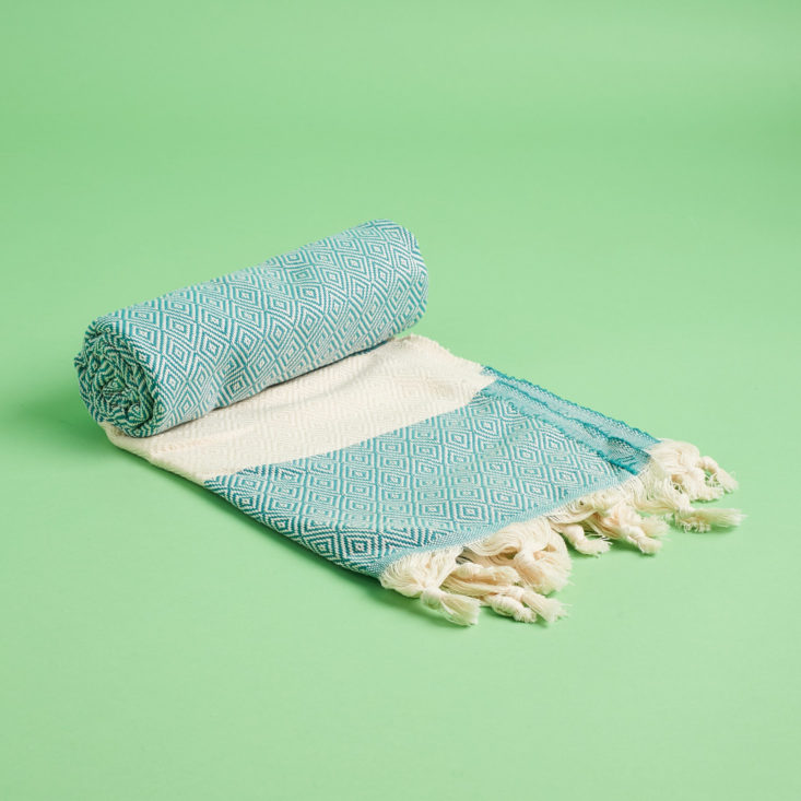 bombay and cedar rolled up towel
