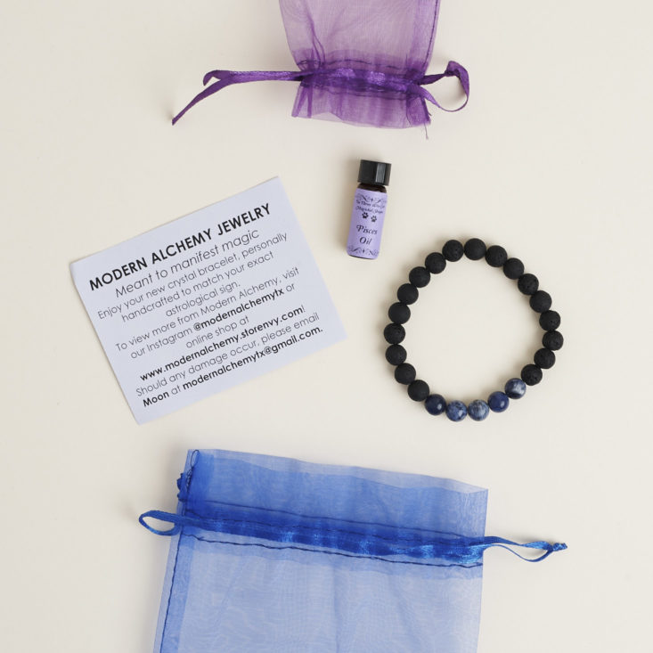 Mesh pouches with bracelet and oil