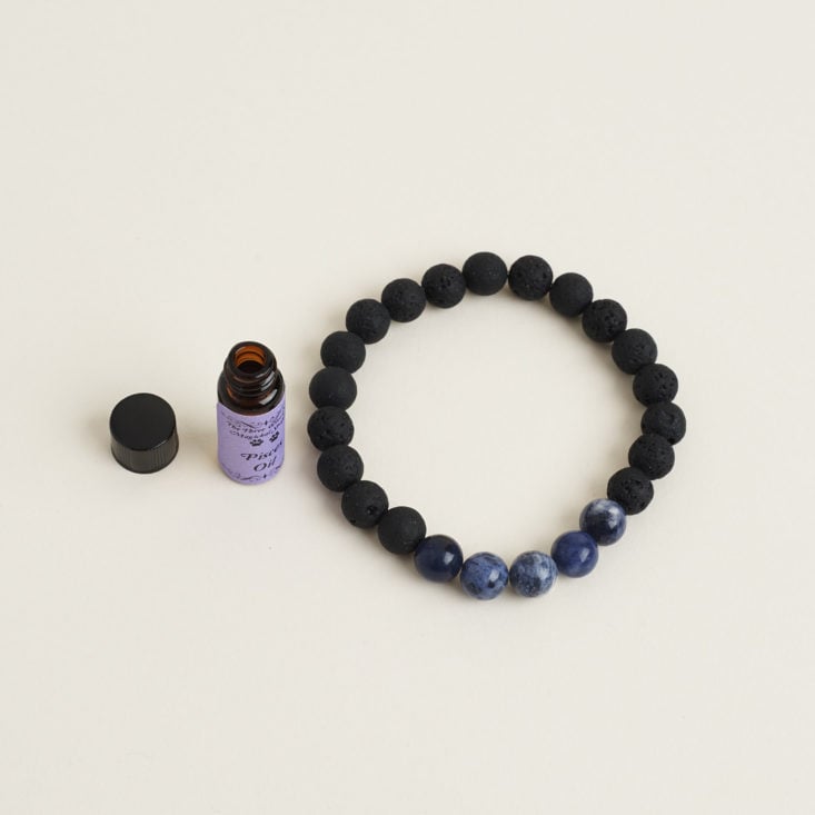 Modern Alchemy Essential Oil Bracelet and opened Zodiac Sign Oil