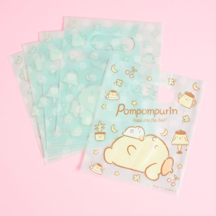 front and back of Pompompurin Handy Bags