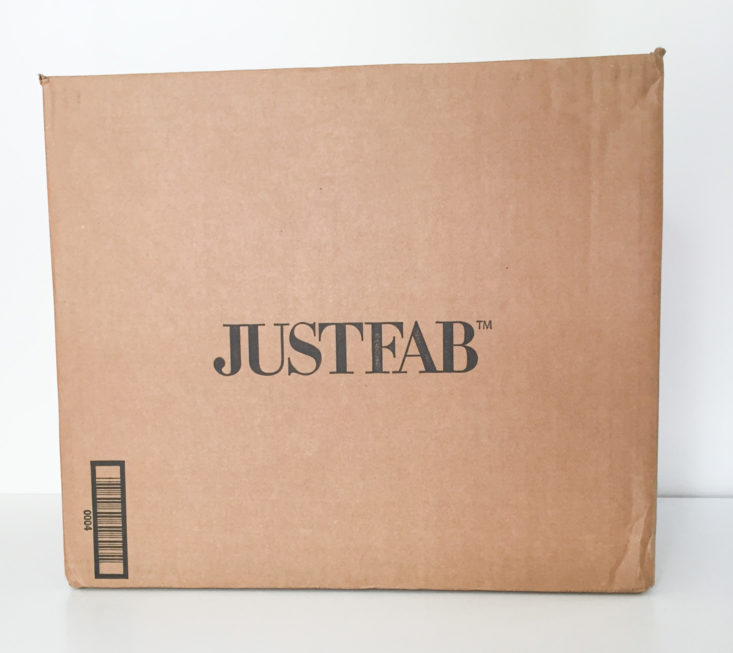 closed cardboard box with justfab printed in black
