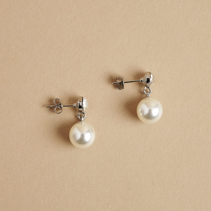 side view of Minimalist pearl and rhinestone earrings