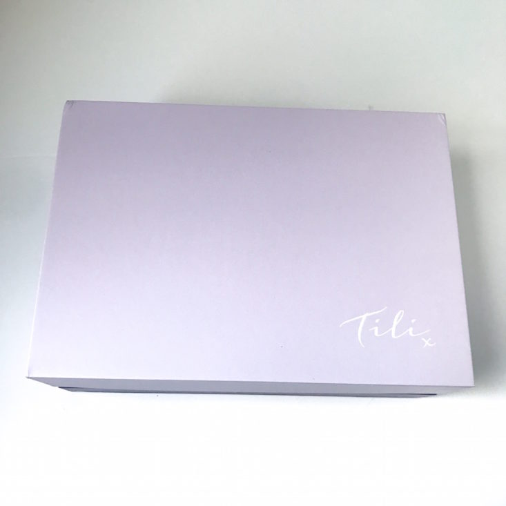 closed purple box with Tili printed in white