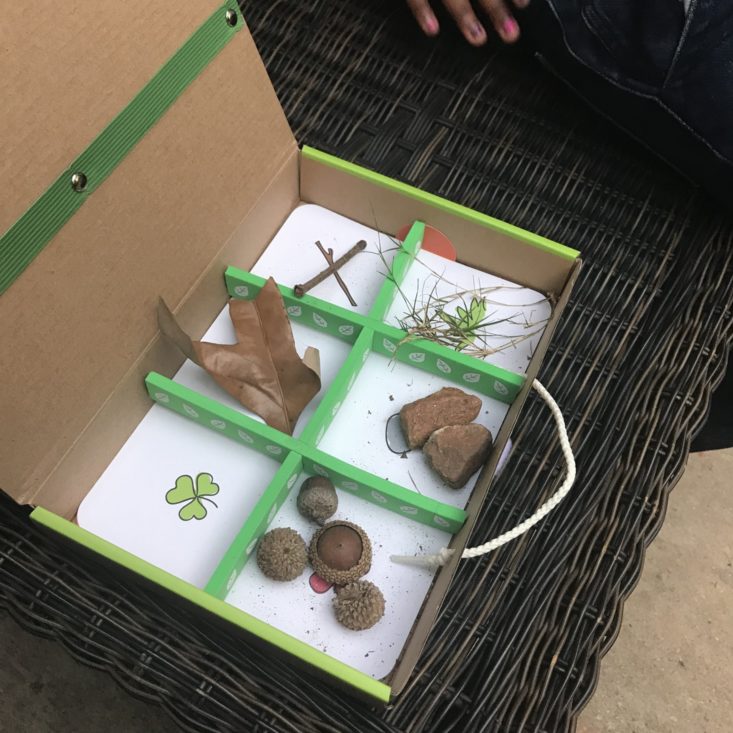 Kids finding Nature Items for Scavenger Hunt Box 3