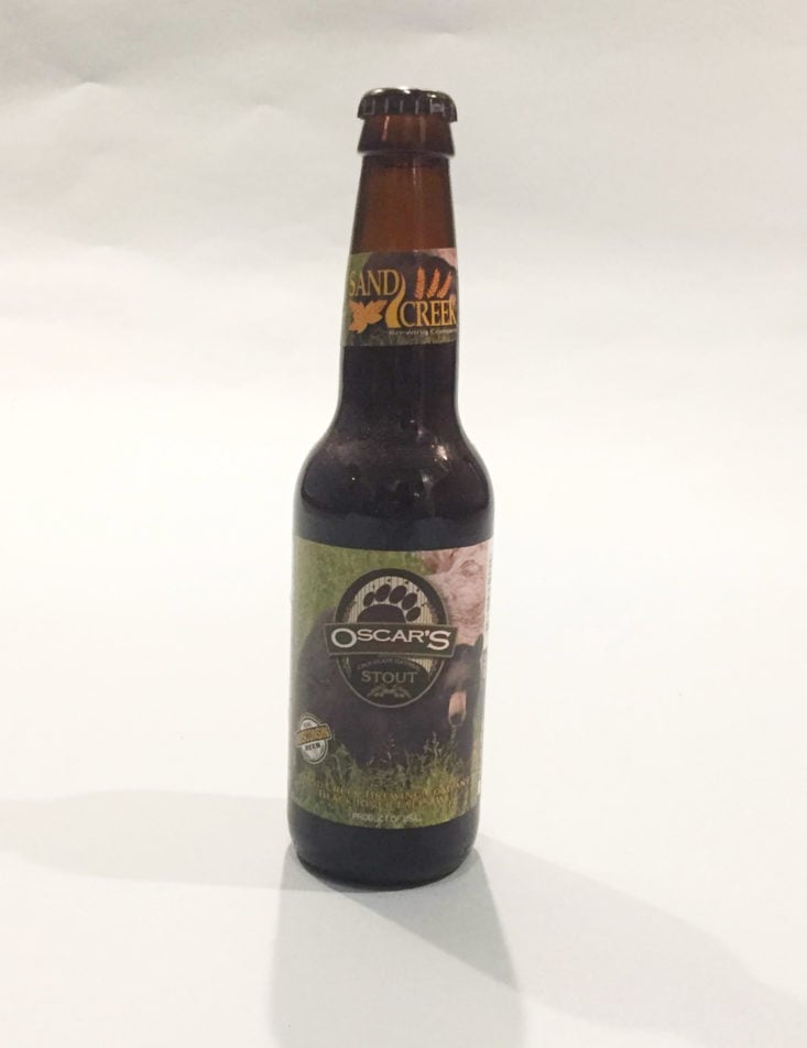 The Microbrewed Beer of the Month Club October 2018 - Sand Creek Oscar’s Stout Bottle Front