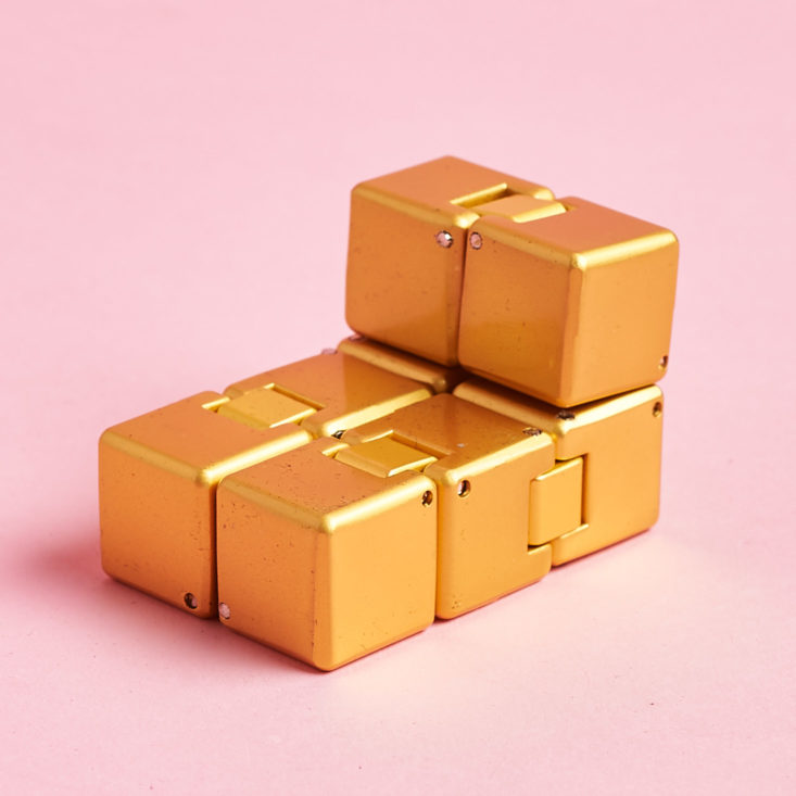 Bombay and Cedar For Him Winter gold fidget toy