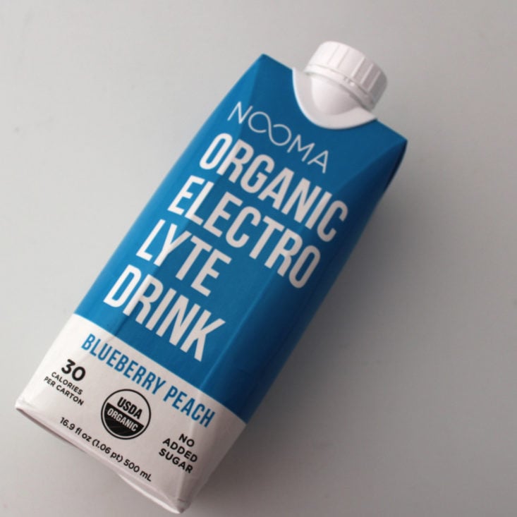 Clean Fit Box April 2019 - Nooma Organic Electrolyte Drink, Blueberry Peach Front