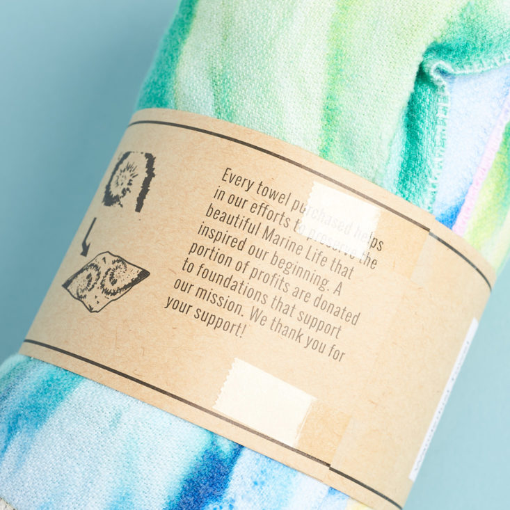 description of and Cloud Wanderlust Towel on label