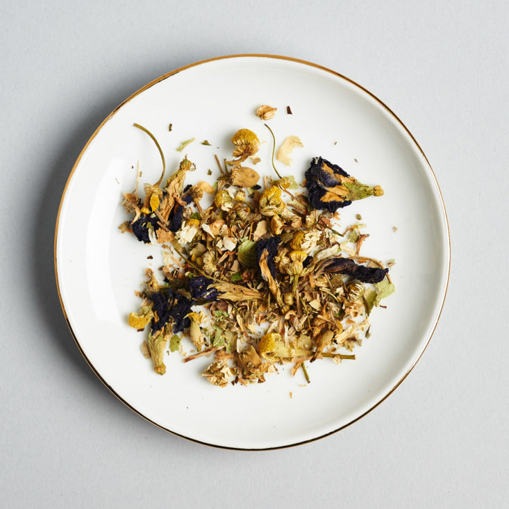 blue chamomile tea loose on dish