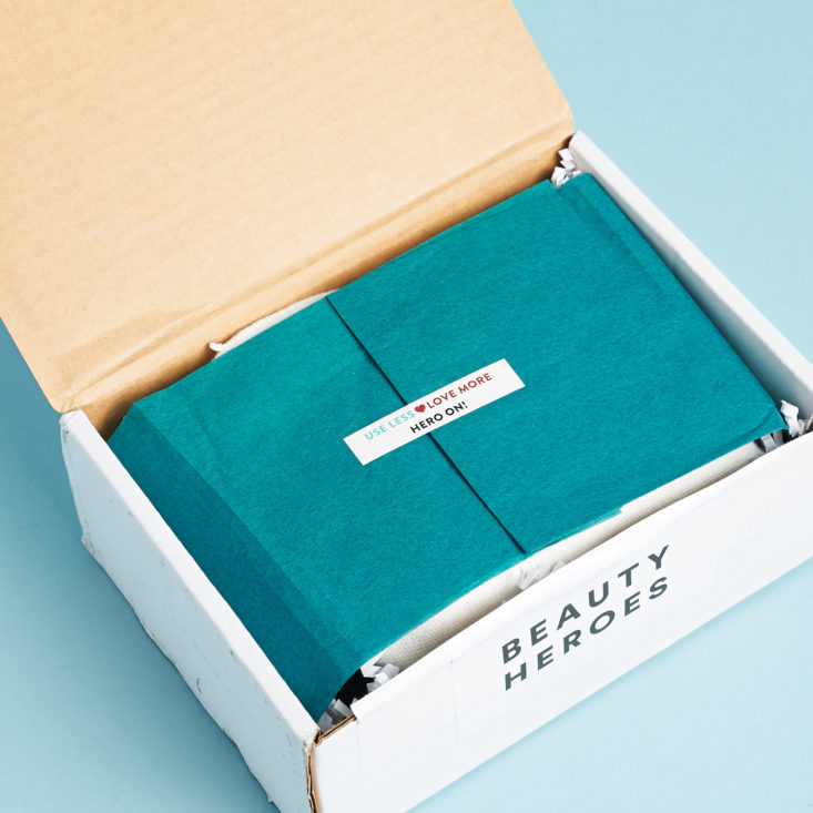 OPen Beauty Heroes Ere Perez Limited Edition Makeup Discovery Box with teal tissue paper