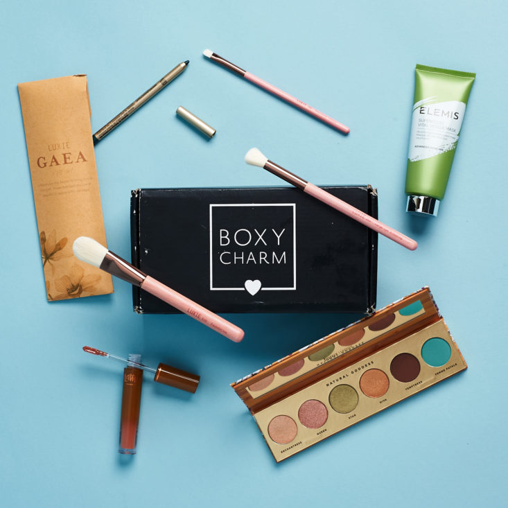boxycharm box with all the included items displayed around it