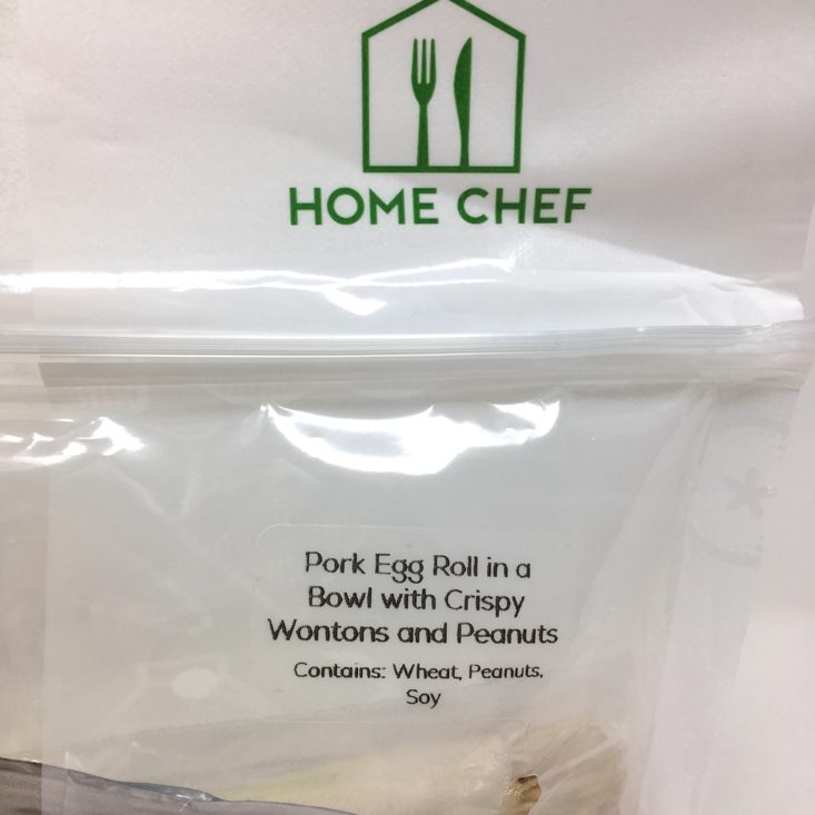 close-up view of the egg roll in a bowl bag label