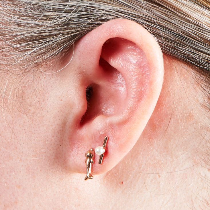 earrings on megans ear