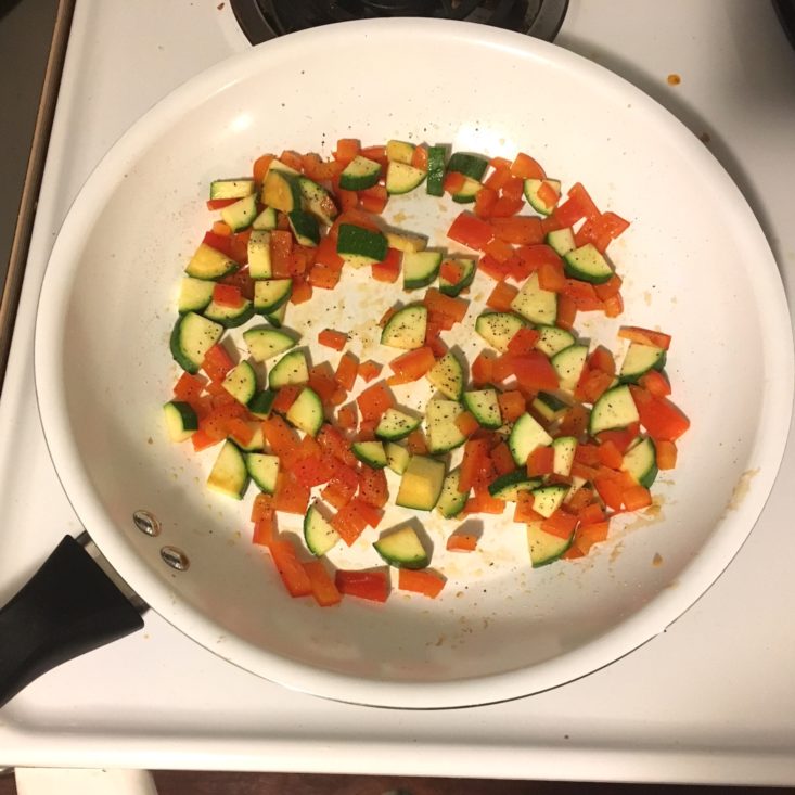 veggies cooking in a pan