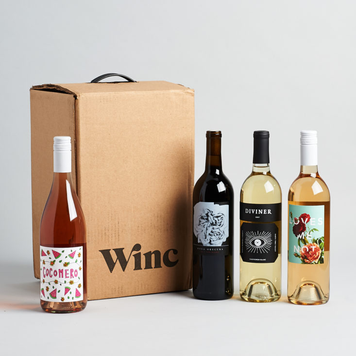 all four wines displayed with the box in which they were shipped