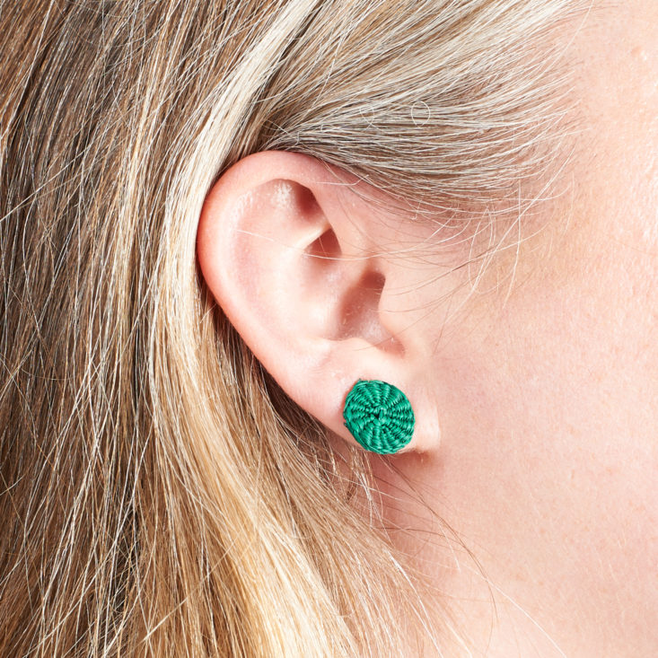 earrings on megans ear