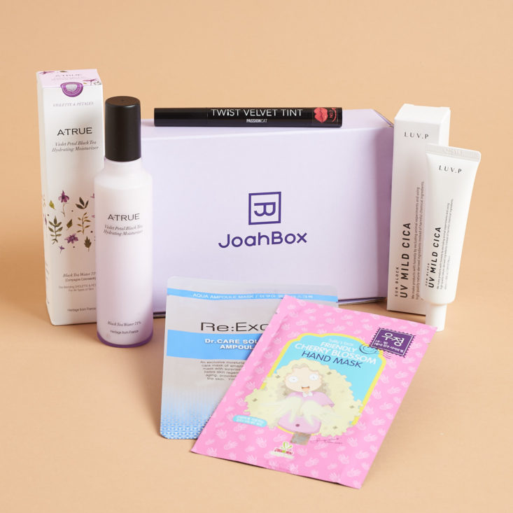 JoahBox with items surrounding it