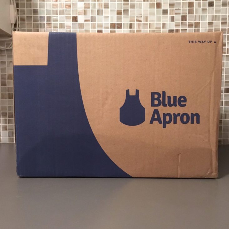 unopened box showing blue apron logo